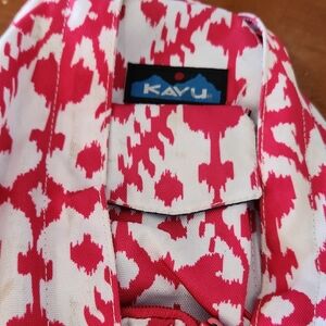 Kavu Rope Sling bag in a hot red/pink and white blot pattern